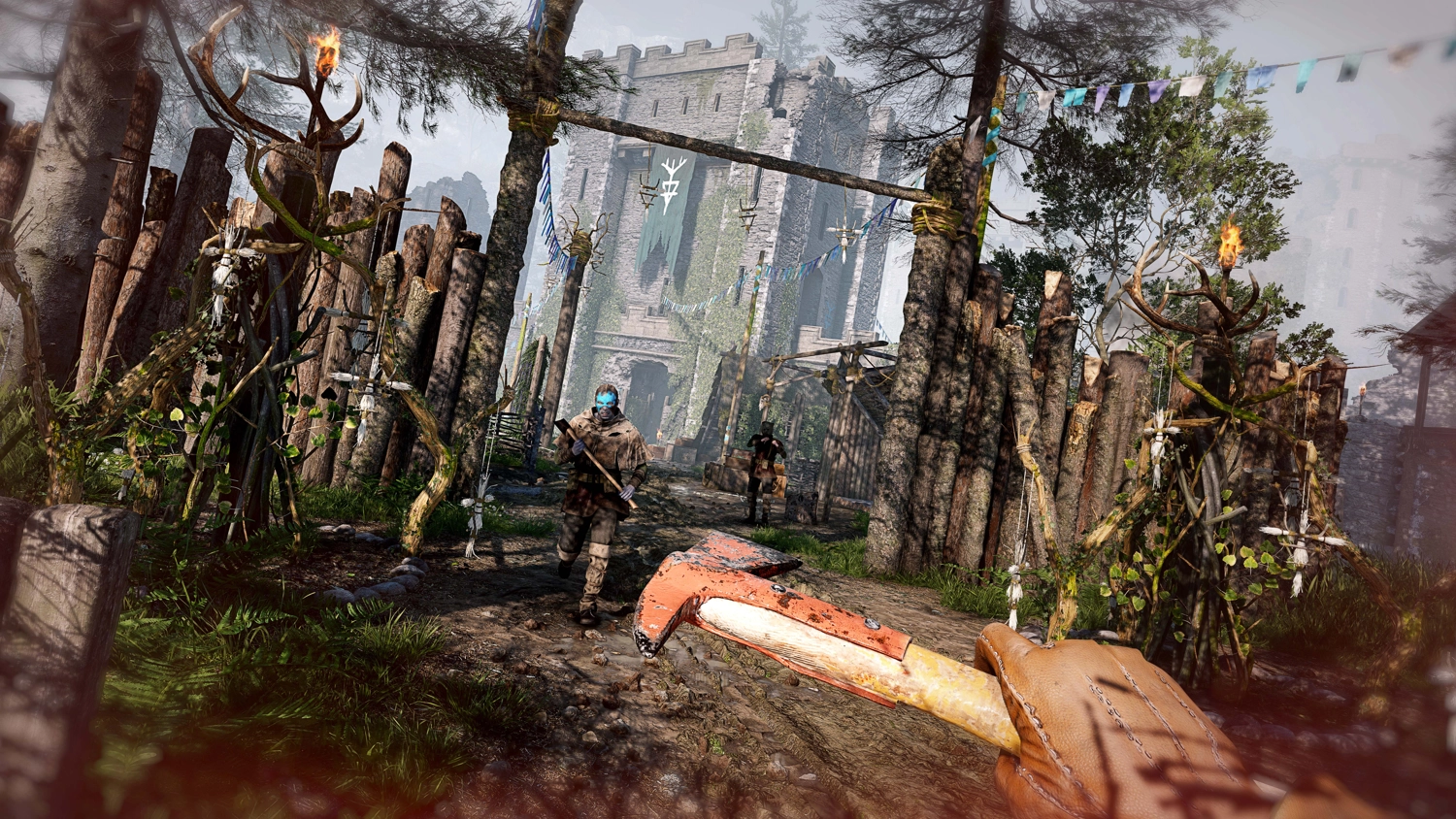 Screenshot of gameplay showcasing enemies defending an occult fort in a forest with a castle looming in the background. The player holds a hatchet in their hand.